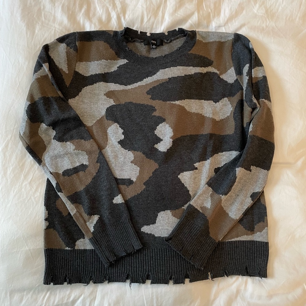 FATE camo distressed hem sweater